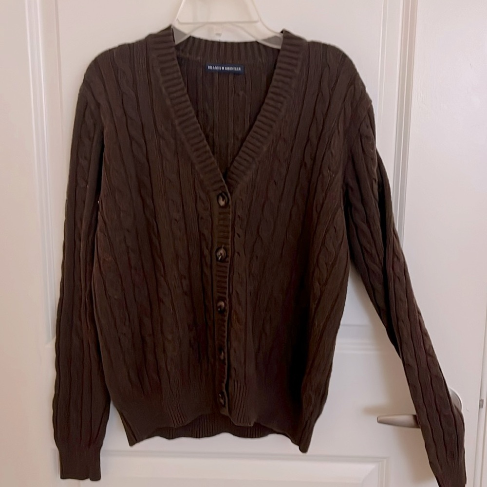 Brown cardigan it is 19” wide